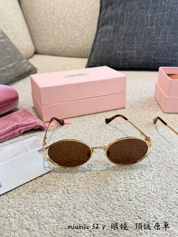 Miu Miu 52Y Gold Oval Sunglasses