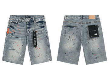 Light Blue Washed Denim Shorts with Multicolor Paint Splatter and Knee Distressing