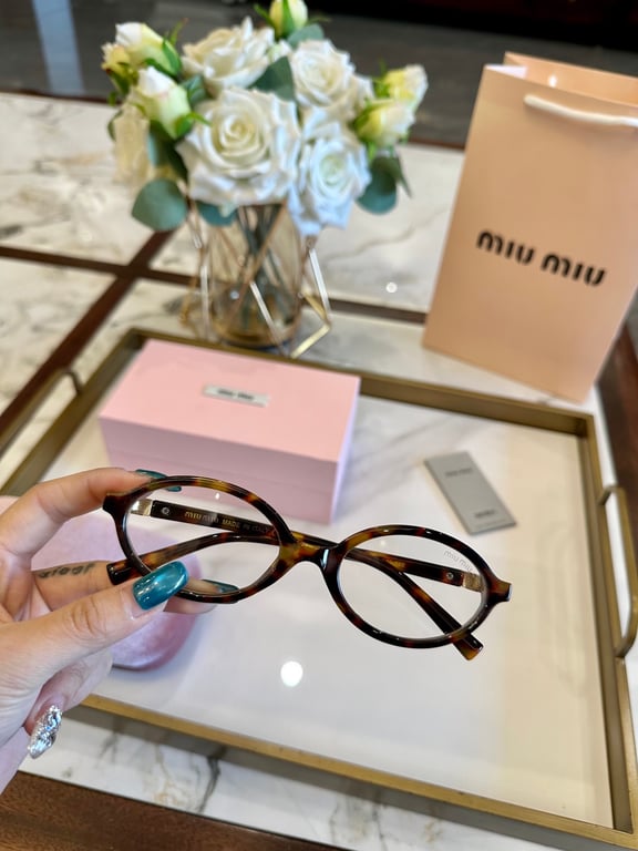 Miu Miu Tortoiseshell Round Optical Glasses