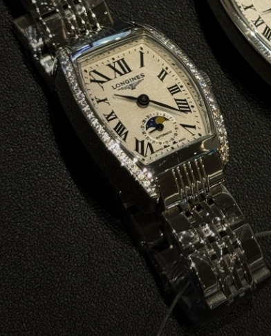 The Longines Heritage Collection L2.155.4.71.5 features a classic tonneau-shaped stainless steel case.