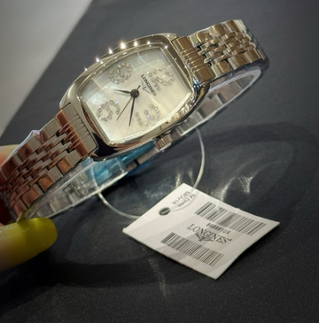 The Longines Heritage Collection L2.155.4.71.5 features a classic tonneau-shaped stainless steel case.