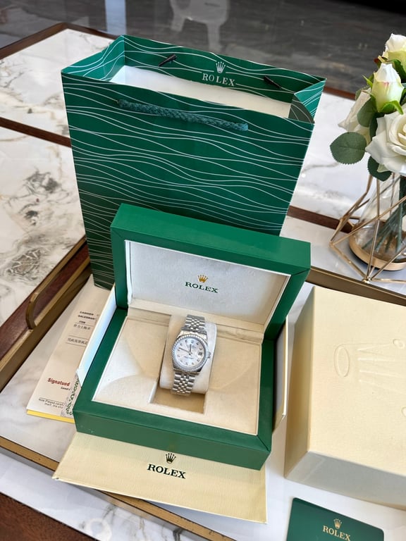 Rolex Datejust White Dial Diamond Bezel Jubilee Bracelet