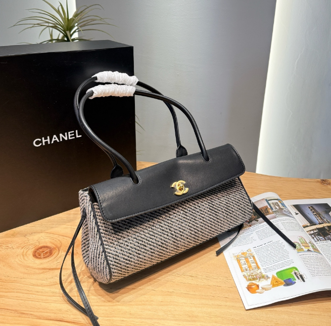 Chanel 
26S tweed baguette bag