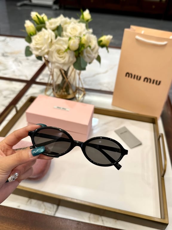 Miu Miu Black Oval Sunglasses