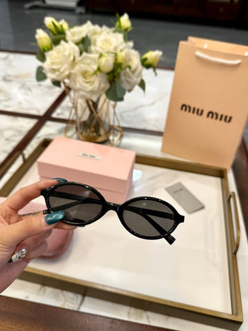Miu Miu Black Oval Sunglasses