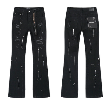 Black Flared Denim Jeans with White Paint Streaks and Heavy Distressing
