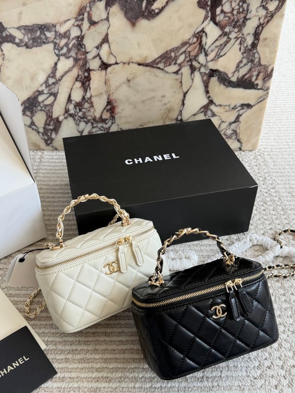 Chanel 
25P Black Gold Lunch Bag