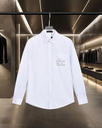 Louis Vuitton minimalist and versatile long-sleeved shirt with beaded logo embroidery on the front pockets.